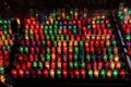 Lighted colourful Catholic candles, MonasteryÃÂ ofÃÂ Montserrat, Catalonia,ÃÂ Spain